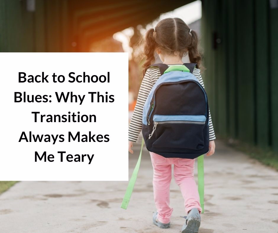 Little girl walking away with backpack